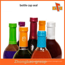 Heat sensitive customizable attractive tamper evident shrink bands for bottle neck packaging